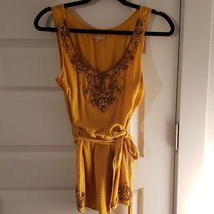 Mustard colored blouse with wood beaded detailing